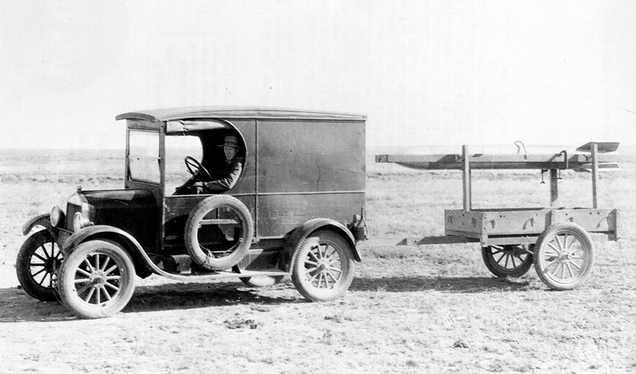 Robert Goddard tows a rocket to the launching tower behind a Model A Ford truck near Roswell, New Mexico circa 1931 (NASA)